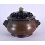 A CHINESE QING DYNASTY BRONZE CENSER AND COVER bearing Xuande marks to base, with jade finial. 15.