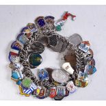 A SILVER CHARM BRACELET. 99 grams. 5.5 cm internal diameter.