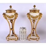 A PAIR OF 19TH CENTURY FRENCH ORMOLU AND WHITE MARBLE VASES AND COVERS mounted with mask heads and