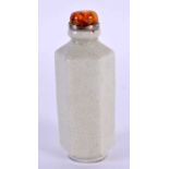 A CHINESE QING DYNASTY GE TYPE HEXAGONAL SNUFF BOTTLE with amber stopper. 8.5 cm high.