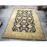 A large Indian rug 290 x 186 cm.