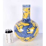 A Chinese yellow ground blue and white porcelain vase bearing Ming marks, decorated with a dragon.