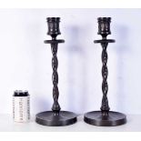 A pair of 1920's wooden Barley Twist candlesticks 39 cm (2).