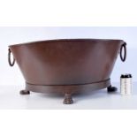 A large cast iron fire pit / planter 30 x 70 x 56 cm.