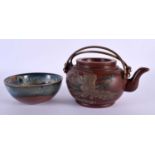 A CHINESE REPUBLICAN PERIOD YIXING POTTERY TEAPOT AND COVER together with a slip decorated bowl.