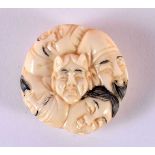 A JAPANESE CARVED BONE MASK HEAD NETSUKE. 5 cm x 3 cm.