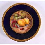 A ROYAL WORCESTER BLUE GROUND CABINET PLATE painted with fruit by Price. 23 cm diameter.