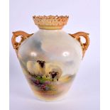 Royal Worcester two handled vase with reticulate rim painted with sheep by Harry Davis, signed H.