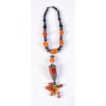 AN ANTIQUE MIDDLE EASTERN AMBER NECKLACE. 73 grams. 41 cm long.