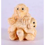 A JAPANESE BONE MONKEY OKIMONO. 5 cm x 3 cm.