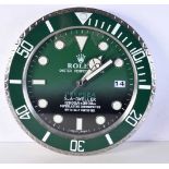 A Contemporary Rolex dealership style wall clock 34 cm.