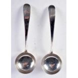 A PAIR OF ANTIQUE SILVER LADLES. 84 grams. 17 cm x long.