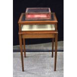 An antique Bijouterie table together with a small glass and wood jewellery display box 76 x 49 x