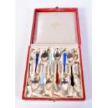 A SET OF NORWEGIAN SILVER AND ENAMEL SPOONS. 64 grams. 9.5 cm long. (6)