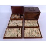 AN EARLY 20TH CENTURY CHINESE MAHJONG BAMBOO AND BONE SET within original case. 24 cm x 16 cm.