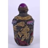 A 19TH CENTURY CHINESE BRONZE SNUFF BOTTLE decorated with figures and landscapes. 8 cm x 4 cm.