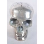 A SILVER PLATED SKULL. 12 cm x 9.5 cm.