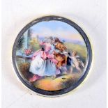 AN ANTIQUE CONTINENTAL SILVER AND ENAMEL COMPACT. 5.5 cm x 1 cm.