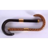 TWO VINTAGE SNAKESKIN CANE HANDLES. 18 cm long. (2)