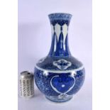 A LARGE 19TH CENTURY CHINESE BLUE AND WHITE PORCELAIN BULBOUS VASE bearing Kangxi marks to base.