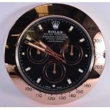 A Contemporary Rolex dealership style wall clock 34 cm.