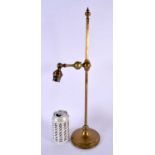 AN ANTIQUE ADJUSTABLE BRONZE LAMP. 48 cm high.