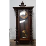 A mid century wooden regulator clock 78 x 45 cm.