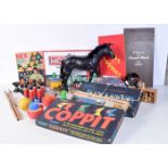 A collection of vintage games and toys including a Canadian Action man (Qty).