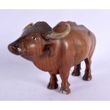 A FINE 19TH CENTURY ANGLO INDIAN CARVED HARDWOOD AND HORN BULL. 18 cm x 12 cm.