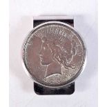 A SILVER DOLLAR MONEY CLIP. 49.5 grams. 5 cm x 4 cm.