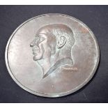 A heavy bronze plaque by E. Tramaux c.1920 of Albert Kreglinger (1874-1953). Diameter 50cm.