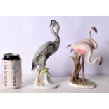 An Austrian ceramic pair of Flamingos together with another ceramic Herron 24cm tall. (2)