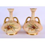 Royal Worcester pair of two handled vases painted with heathers on a blush ivory ground date code