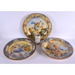 THREE LARGE 19TH CENTURY ITALIAN MAJOLICA DISHES painted with figures. 34 cm diameter. (3)