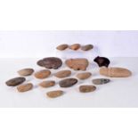 A collection of early Central Asian stone carvings and tools largest 15 cm (18).