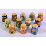 TWELVE CHINESE CLOISONNE ENAMEL THIMBLES 20th Century. 3 cm x 2 cm. (12)