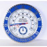 A Contemporary Rolex dealership style wall clock 34 cm.