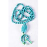 A TURQUOISE NECKLACE. 85 grams. 86 cm long.