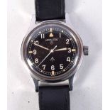 A HAMILTON BLACK DIAL MILITARY WRISTWATCH. 3.75 cm wide inc crown.