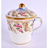 Sevres chocolate cup and cover painted with roses surrounded by gilding, interlaced L’s gg and