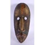A TRIBAL CONGOLESE AFRICAN METAL BOUND WOOD MASK. 30 cm x 8 cm.