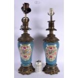 A LARGE PAIR OF 19TH CENTURY FRENCH PORCELAIN COUNTRY HOUSE LAMPS painted with birds. 58 cm high.