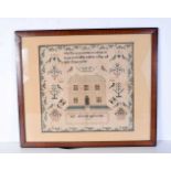 A framed sampler dated 1847. 30 x 32cm.