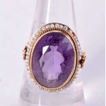 A GOLD AMETHYST AND PEARL RING. 5.2 grams. K.
