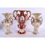 19th century Coalport type crimson ground two handled vase with floral panels and a pair of