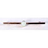 A 9CT GOLD AND OPAL BAR BROOCH. 2.5 grams. 6.25 cm long.