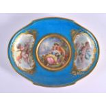 Sevres dish each of lobed form with bleu celeste grounds painted centrally with classical lovers