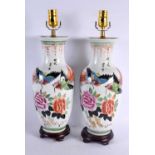 A PAIR OF CHINESE PORCELAIN LAMPS 20th Century. 48 cm high.