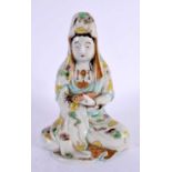 A 19TH CENTURY JAPANESE MEIJI PERIOD AO KUTANI PORCELAIN FIGURE modelled holding a scroll. 17 cm