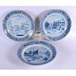 THREE LARGE DELFT BLUE AND WHITE PORCELAIN PLATES. 32 cm diameter. (3)